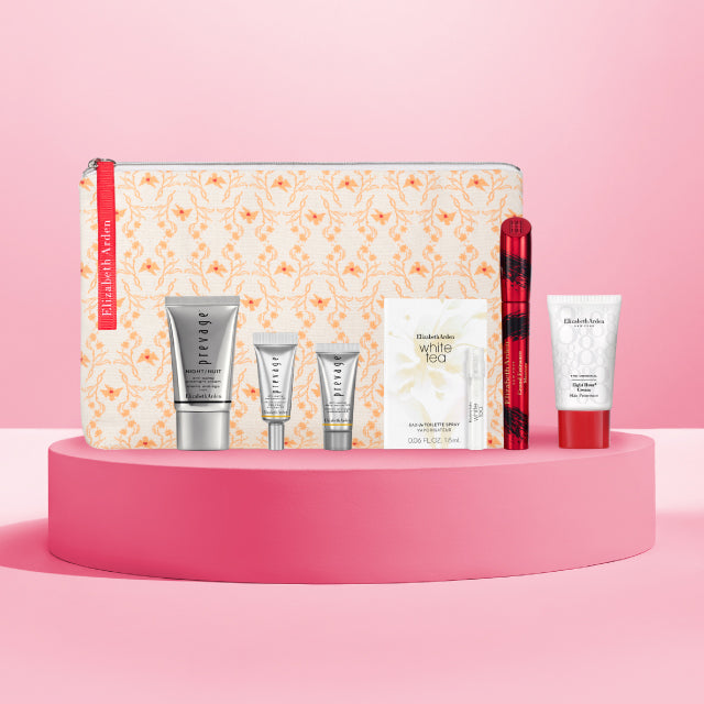 7-piece gift featuring 6 deluxe products and an orange floral print cosmetic bag